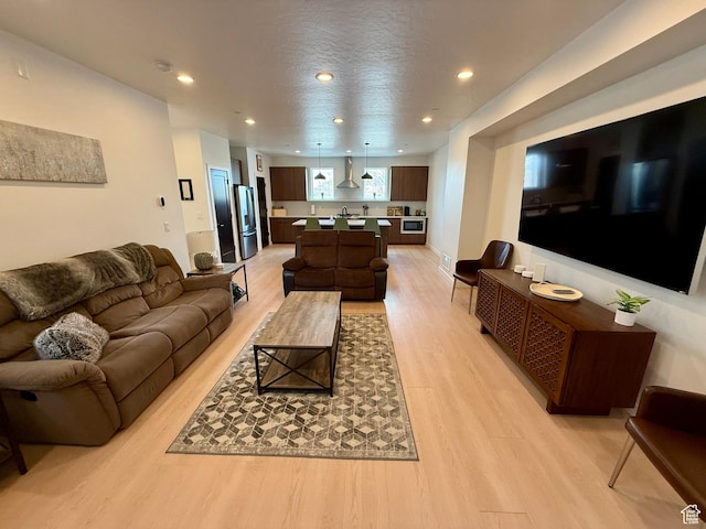 1739 S Main St E Unit 9, Salt Lake City, UT 84115 - living area featuring recessed lighting and light wood-type flooring