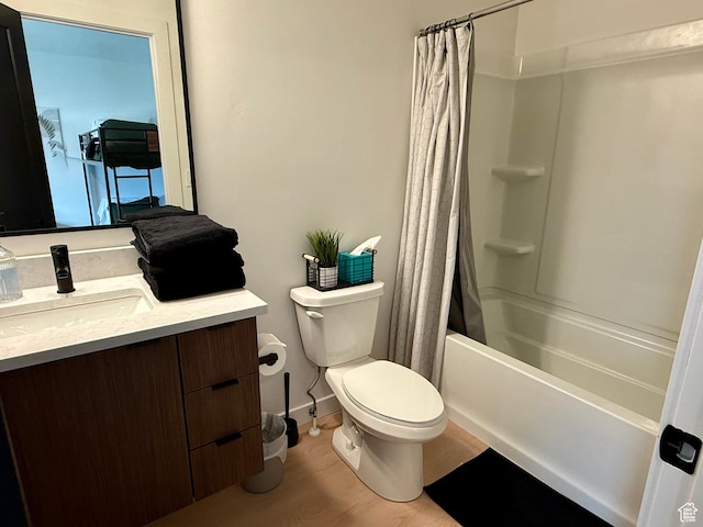 1739 S Main St E Unit 9, Salt Lake City, UT 84115 - bathroom with shower / bath combination with curtain, wood finished floors, vanity, and toilet