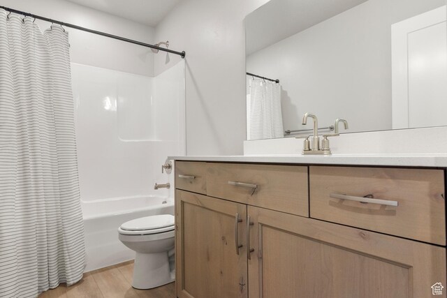 3698 S 5325 W, Hooper, UT 84315 - bathroom with wood finished floors, vanity, toilet, and shower / bath combo