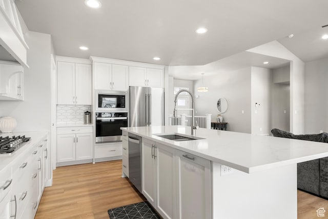 3698 S 5325 W, Hooper, UT 84315 - kitchen with recessed lighting, white cabinets, stainless steel appliances, a sink, and light wood-type flooring