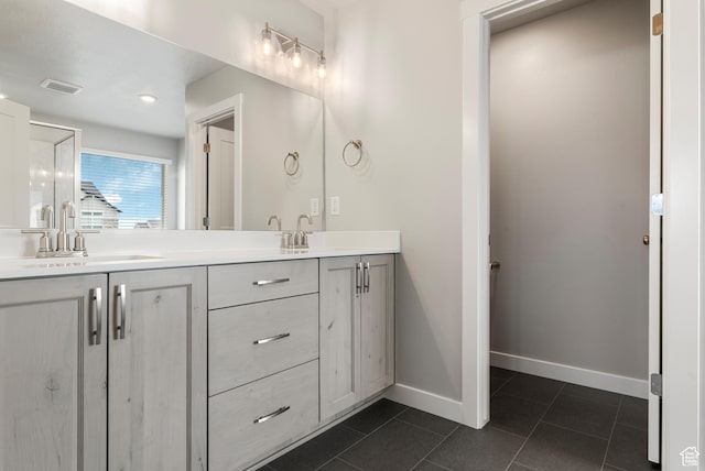 3698 S 5325 W, Hooper, UT 84315 - bathroom with tile patterned flooring, baseboards, a sink, and double vanity
