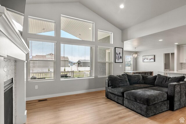 3698 S 5325 W, Hooper, UT 84315 - living area featuring baseboards, recessed lighting, visible vents, an inviting chandelier, and light wood-style floors