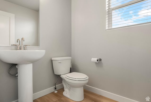 3698 S 5325 W, Hooper, UT 84315 - half bath featuring baseboards, toilet, wood finished floors, and a sink