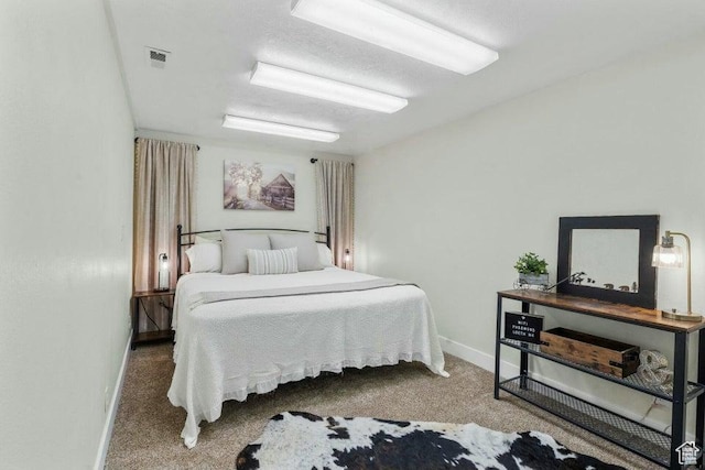 770 W Carter Dr, Pine Valley, UT 84781 - carpeted bedroom featuring baseboards and visible vents