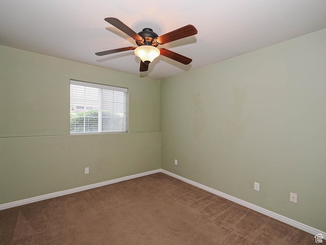 3832 S Big River Way W Unit 1, Salt Lake City, UT 84119 - spare room featuring baseboards, a ceiling fan, and carpet floors