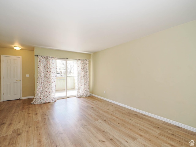 3832 S Big River Way W Unit 1, Salt Lake City, UT 84119 - unfurnished room with baseboards and light wood-type flooring