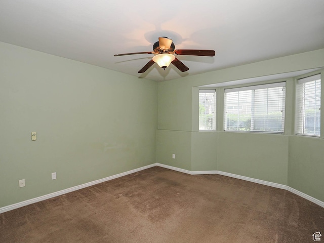 3832 S Big River Way W Unit 1, Salt Lake City, UT 84119 - carpeted empty room with plenty of natural light, a ceiling fan, and baseboards