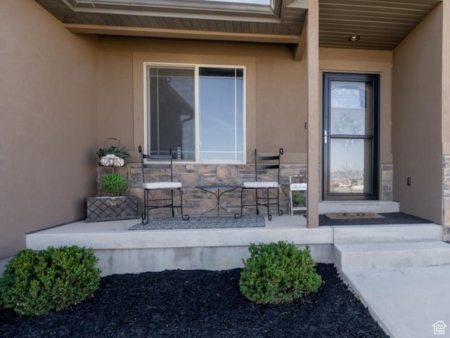 1808 E 2000 S, Naples, UT 84078 - doorway to property with stone siding and stucco siding