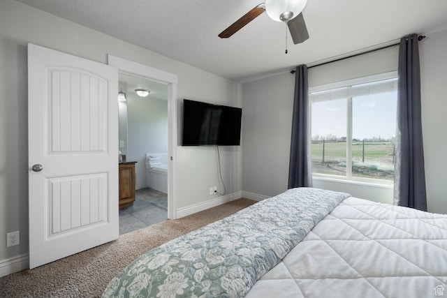 1808 E 2000 S, Naples, UT 84078 - bedroom featuring connected bathroom, baseboards, a ceiling fan, and carpet