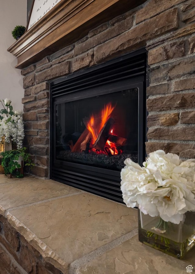 1808 E 2000 S, Naples, UT 84078 - room details featuring a stone fireplace