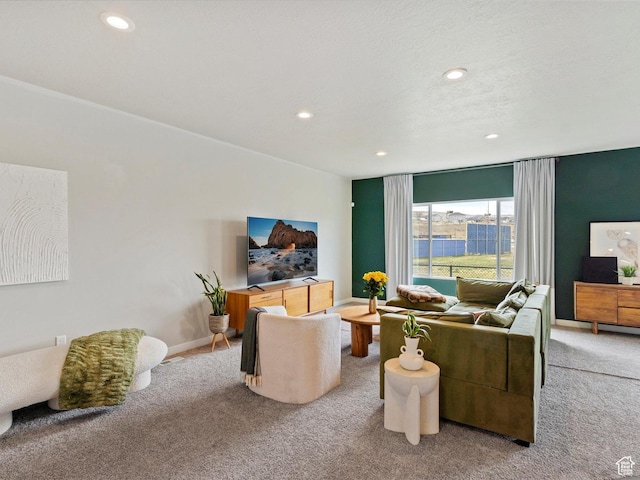 carpeted living room with baseboards and recessed lighting