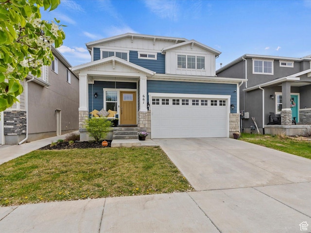 craftsman inspired home with board and batten siding, an attached garage, driveway, stone siding, and a front yard