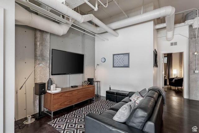 328 W 200 S Unit 505, Salt Lake City, UT 84101 - living area featuring a high ceiling, concrete floors, and visible vents