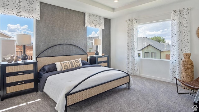 bedroom with carpet flooring, multiple windows, and recessed lighting