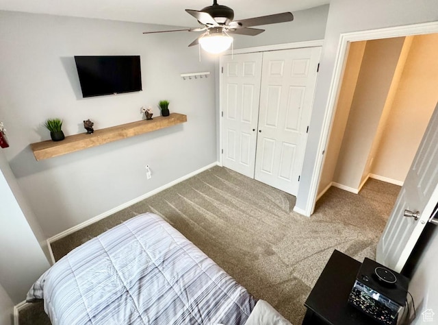 bedroom featuring baseboards, carpet floors, and a closet