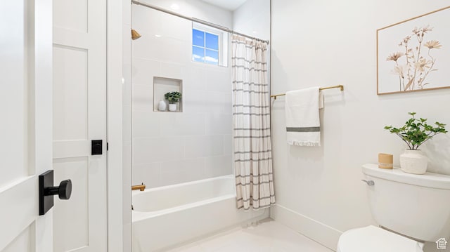 bathroom with shower / bathtub combination with curtain and toilet