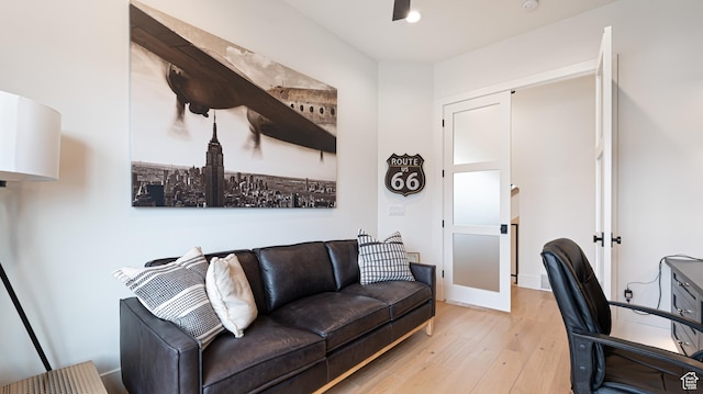 home office with light wood-style flooring