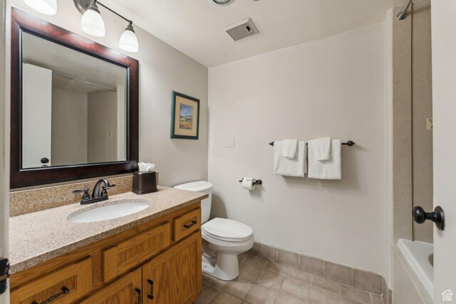 1485 S Empire Ave Unit 216, Park City, UT 84060 - full bathroom with tile patterned floors, visible vents, toilet, vanity, and a shower