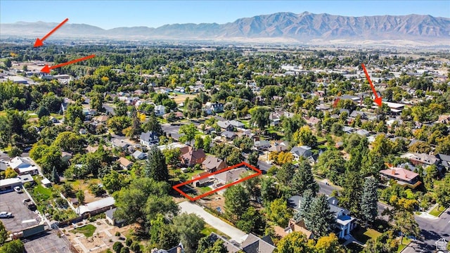 drone / aerial view featuring a mountain view