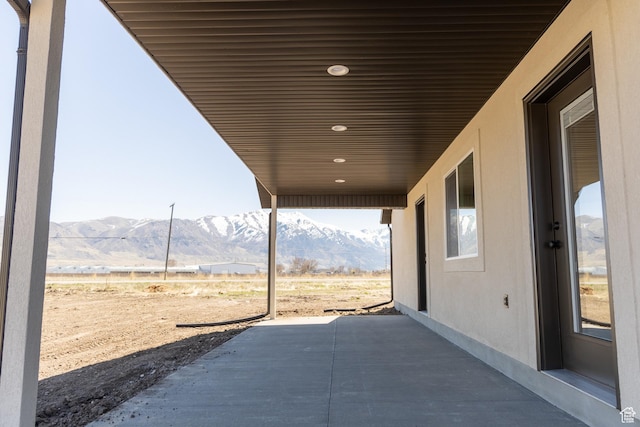 1403 E 1230 S Unit 45, Garland, UT 84312 - view of patio / terrace featuring a mountain view