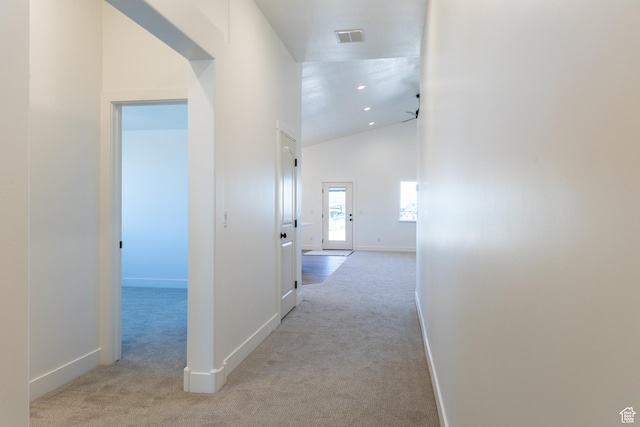 1403 E 1230 S Unit 45, Garland, UT 84312 - hallway featuring high vaulted ceiling, light carpet, visible vents, and baseboards