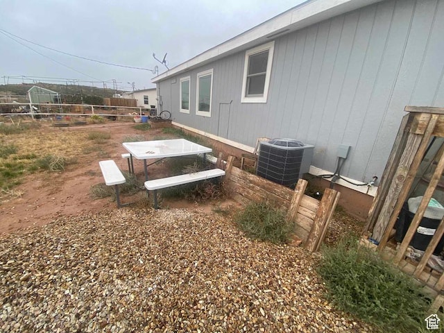 5141 W 940 S, Roosevelt, UT 84066 - view of yard featuring central AC and fence