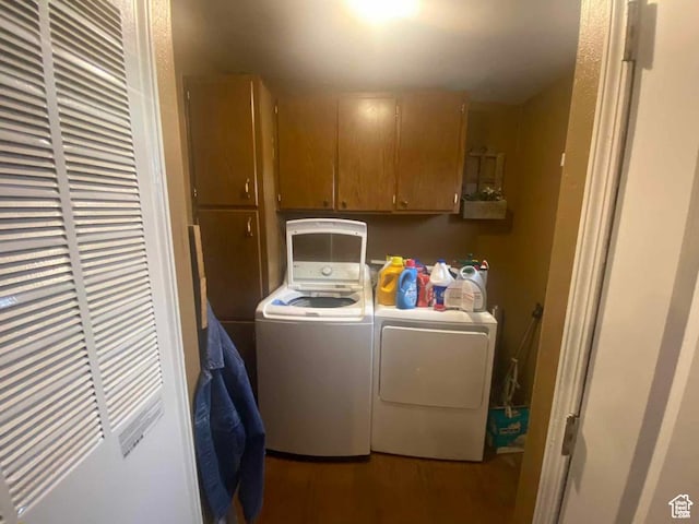 5141 W 940 S, Roosevelt, UT 84066 - laundry room featuring separate washer and dryer, cabinet space, and wood finished floors