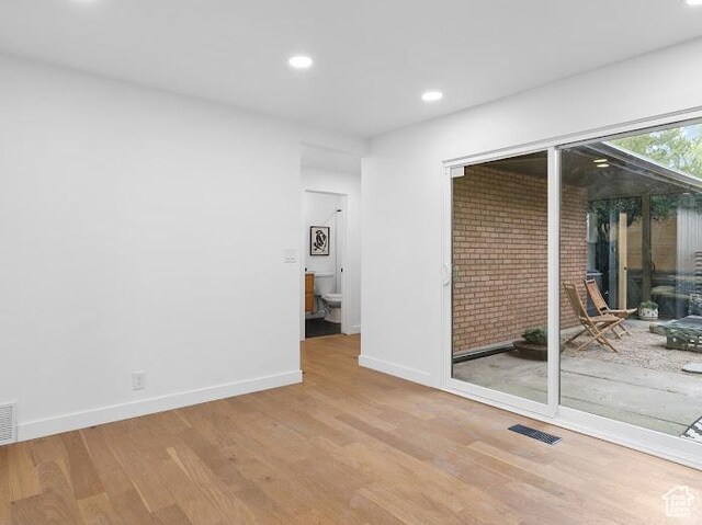 976 E Hyland Lake Dr, Murray, UT 84121 - empty room featuring recessed lighting, wood finished floors, and baseboards