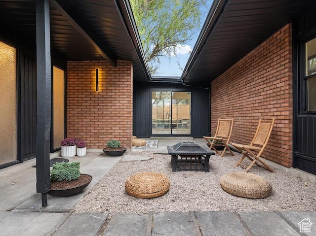 976 E Hyland Lake Dr, Murray, UT 84121 - view of patio / terrace featuring an outdoor fire pit