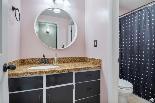 full bath featuring toilet, tile patterned floors, vanity, and curtained shower