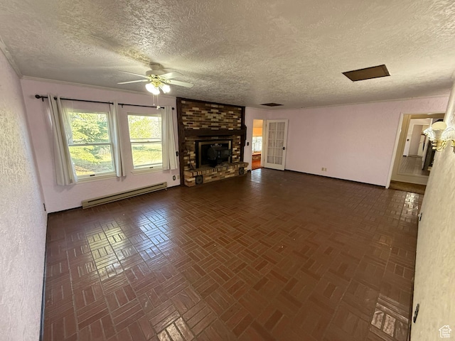 unfurnished living room with a baseboard radiator, a textured ceiling, ceiling fan, a fireplace, and visible vents
