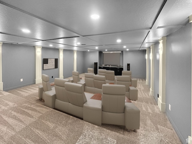carpeted home theater room with baseboards and recessed lighting
