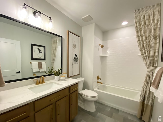 bathroom featuring toilet, vanity, and washtub / shower combination