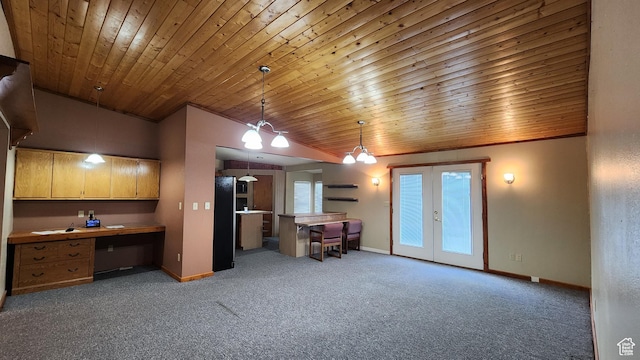 418 S 100 E, Wellington, UT 84542 - carpeted living room with french doors, lofted ceiling, built in desk, and wooden ceiling