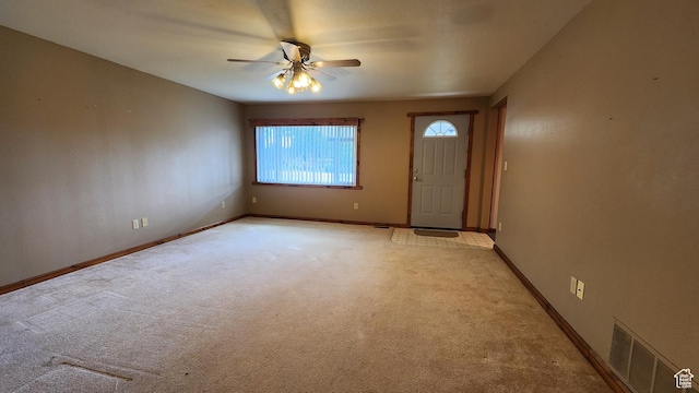 418 S 100 E, Wellington, UT 84542 - unfurnished room featuring ceiling fan and light carpet