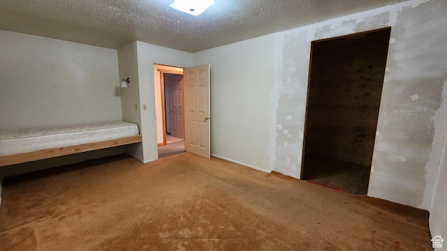 418 S 100 E, Wellington, UT 84542 - unfurnished bedroom with carpet flooring and a textured ceiling