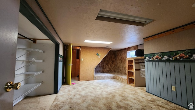 418 S 100 E, Wellington, UT 84542 - below grade area with a textured ceiling and carpet floors