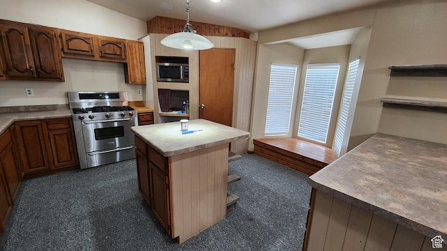 418 S 100 E, Wellington, UT 84542 - kitchen with stainless steel appliances, lofted ceiling, open shelves, hanging light fixtures, and a center island