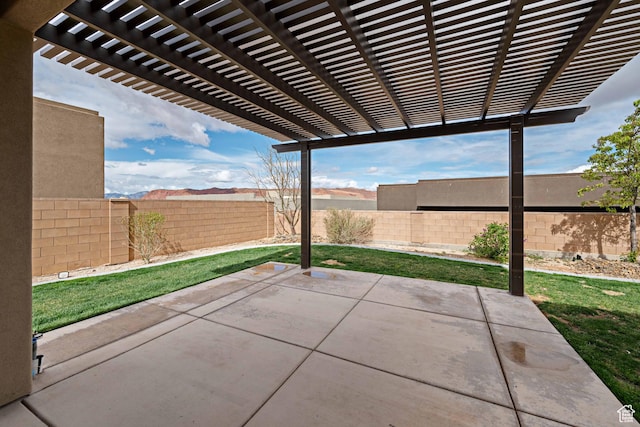 view of patio / terrace featuring a fenced backyard and a pergola
