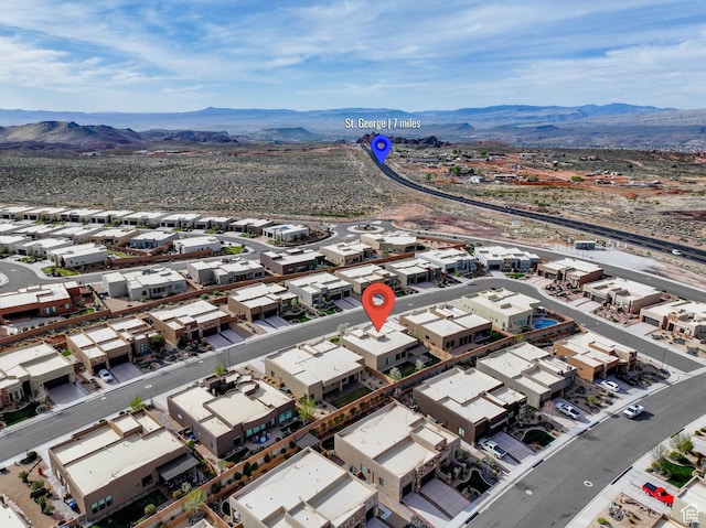 bird's eye view featuring a residential view and a mountain view