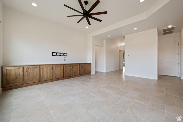 spare room featuring a ceiling fan, light tile patterned flooring, visible vents, and recessed lighting