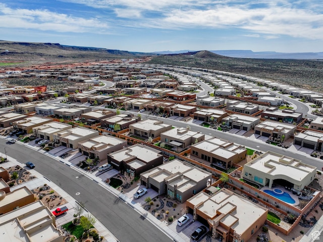 drone / aerial view with a mountain view and a residential view