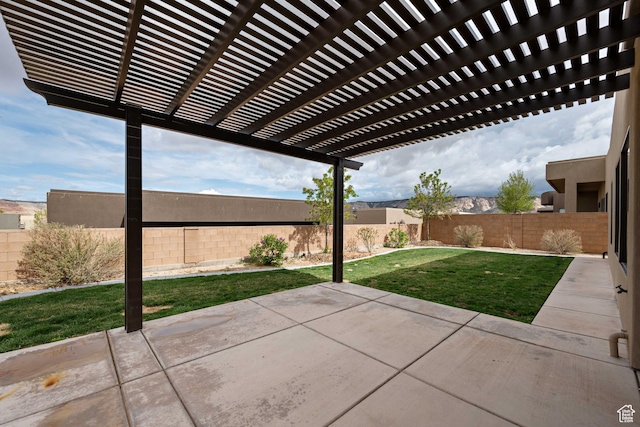 view of patio / terrace featuring a fenced backyard and a pergola