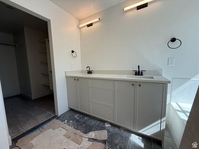 full bathroom featuring double vanity