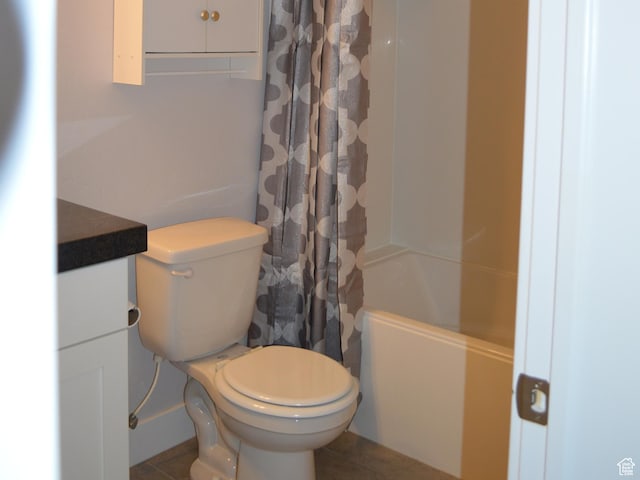1921 N Crest Rd, Saratoga Springs, UT 84045 - bathroom featuring toilet, vanity, shower / bath combo with shower curtain, and tile patterned floors