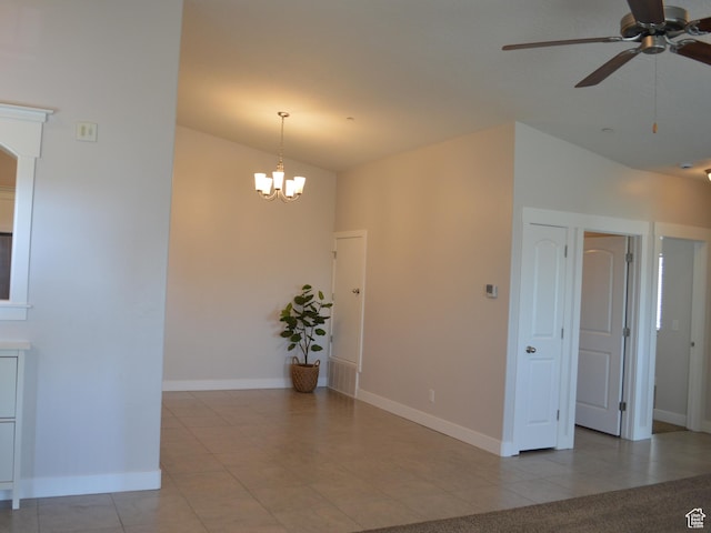 1921 N Crest Rd, Saratoga Springs, UT 84045 - unfurnished room featuring a ceiling fan, light tile patterned floors, baseboards, and a chandelier