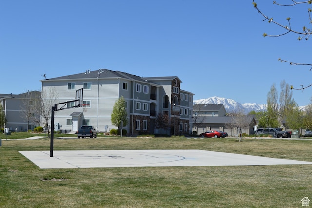 1921 N Crest Rd, Saratoga Springs, UT 84045 - view of basketball court with a mountain view, a lawn, and community basketball court