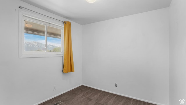22 W La Vista Dr S, West Jordan, UT 84088 - unfurnished room with visible vents, baseboards, and dark carpet