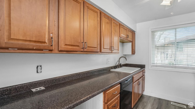 22 W La Vista Dr S, West Jordan, UT 84088 - kitchen with dark countertops, dishwasher, visible vents, a sink, and dark wood-type flooring