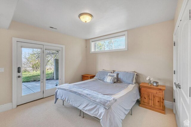 943 N Terrace Dr, Provo, UT 84604 - bedroom with baseboards, visible vents, light colored carpet, and access to outside